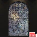 Stained glass window with arch